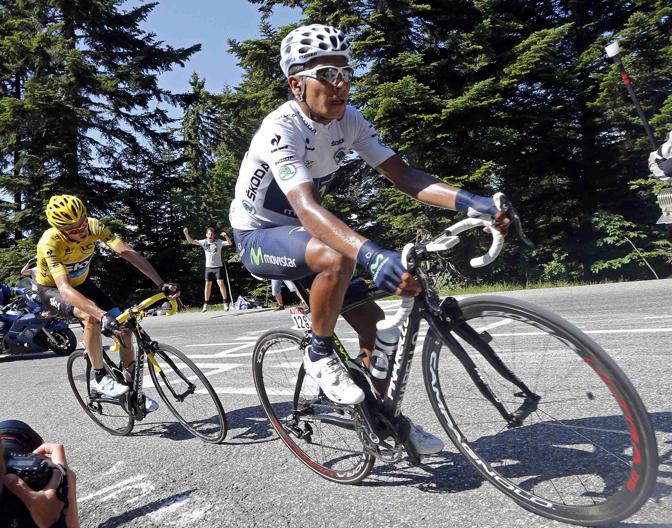 Nairo Quintana si  aggiudicato l'ultimo traguardo in salita del Tour numero 100, conquistando la  tappa da Annecy a Annecy-Semnoz. Sullo sfondo il britannico Chris Froome, che ha chiuso al terzo posto: domani sfiler in giallo a Parigi. Reuters